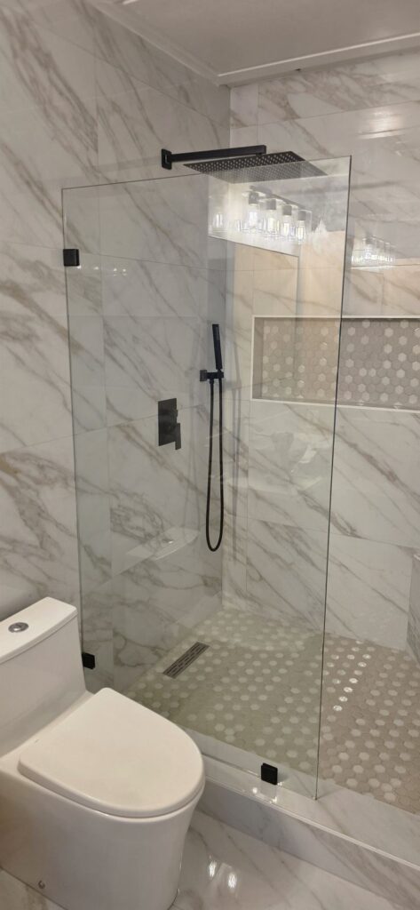 Frameless shower with marble tile – Fixora Remodeling, Plano TX