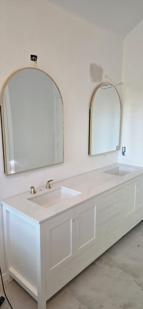 Double vanity with arched mirrors – Fixora Remodeling, Plano TX