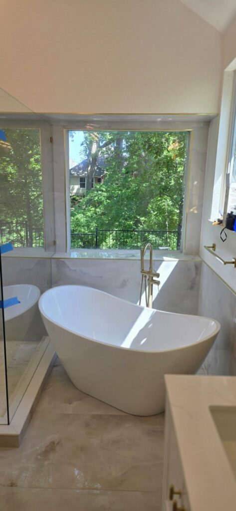 Freestanding tub by the window – Fixora Remodeling, Plano TX