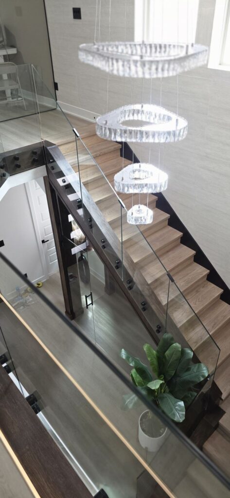 Glass railing with LED stair lights – Fixora Remodeling, Plano TX