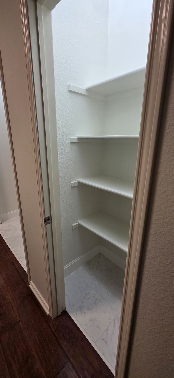 Semi-gloss paint on shelves and trim is durable and easy to wipe clean.