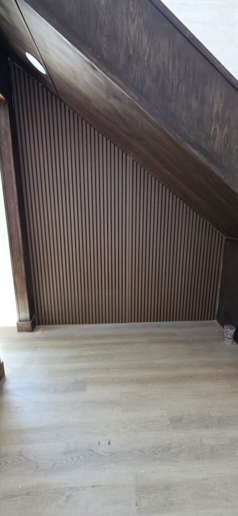 Slat wall under stairs – Fixora Remodeling, Plano TX