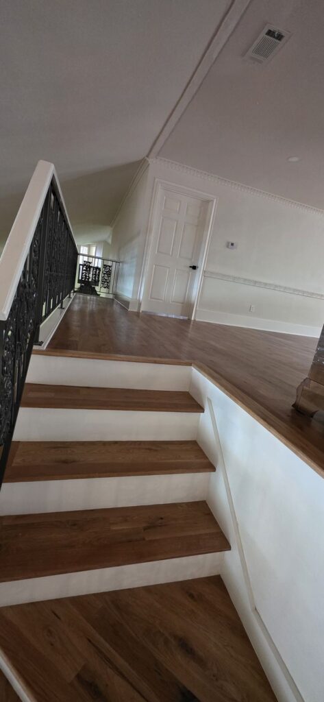 Hardwood stairs & landing – Fixora Remodeling, Plano TX